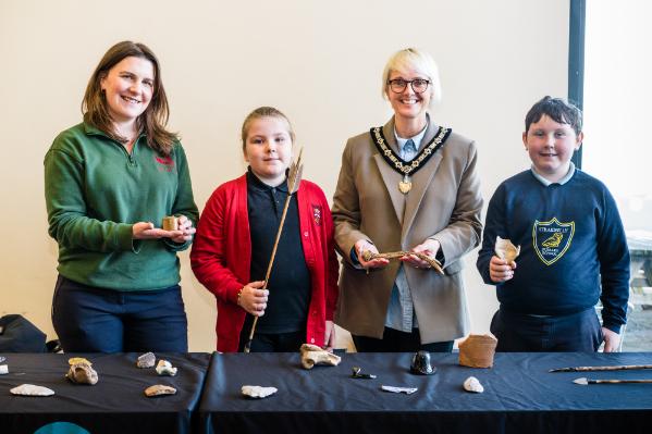 (L-R) G McAlister CCGHT Project Officer, Bushmills Primary School pupil, Deputy Mayor Cllr T Stirling Causeway Coast & Glens Borough Council and Straidbilly Primary School pupil.